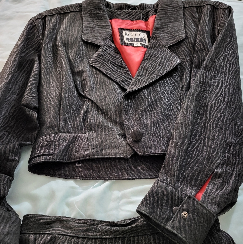 Black suede jacket and skirt.